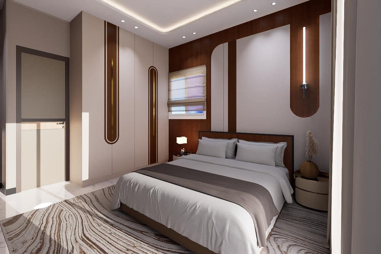 Symmetrical composition centred on the walnut headboard.